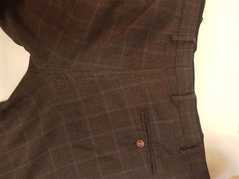 Checked trousers after repair